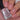 Nail polish bottle with 'Hit the Bottle' text held by a hand with pink nails.