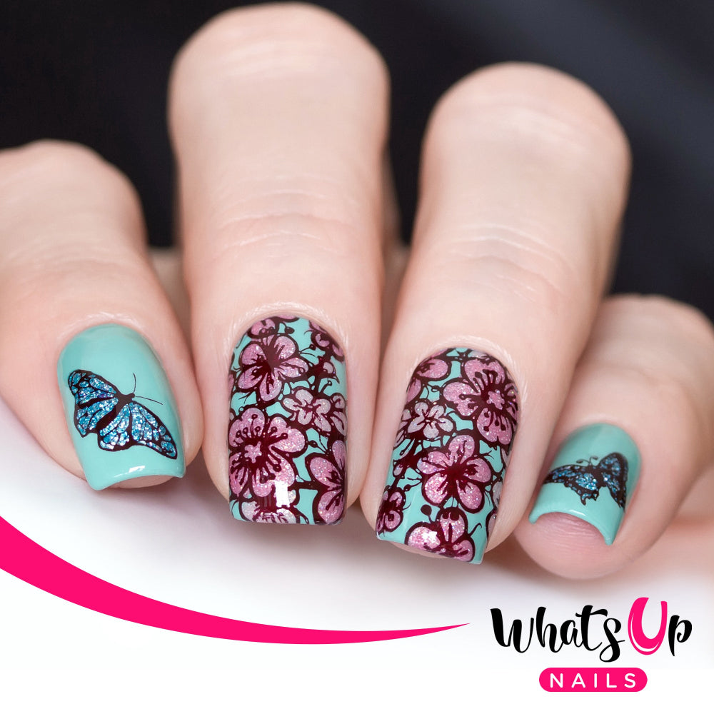 turquoise nails with pink flowers and butterflies