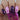 magenta stamping polish swatch over black and white nails