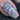 macro one nail green stamping over purple base