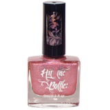 Under the Strobe-berry lights, is a pale red holo stamping nail polish from Hit the Bottle.