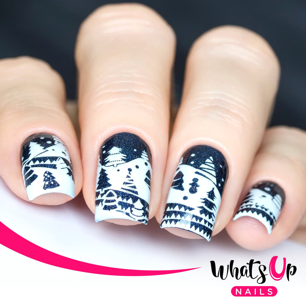 white stamping on dark blue nails, snow fall christmas design with trees