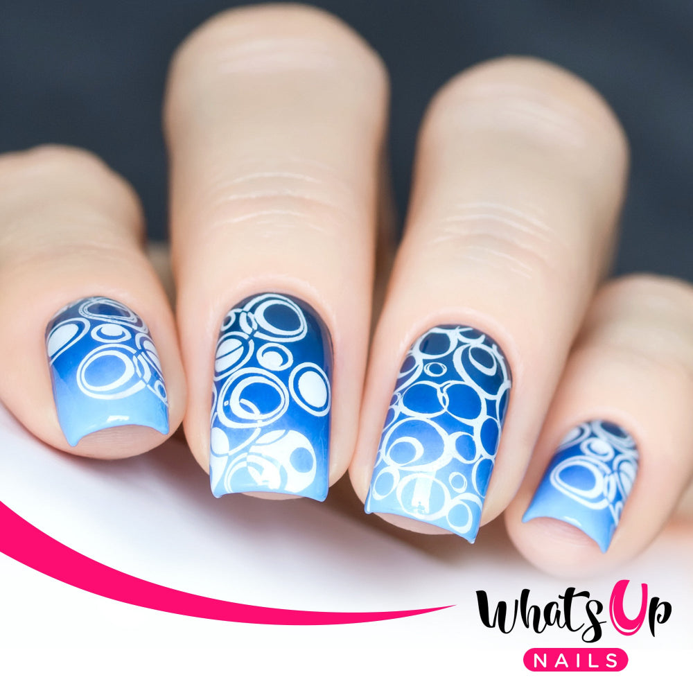 blue gradient nails with white circle design