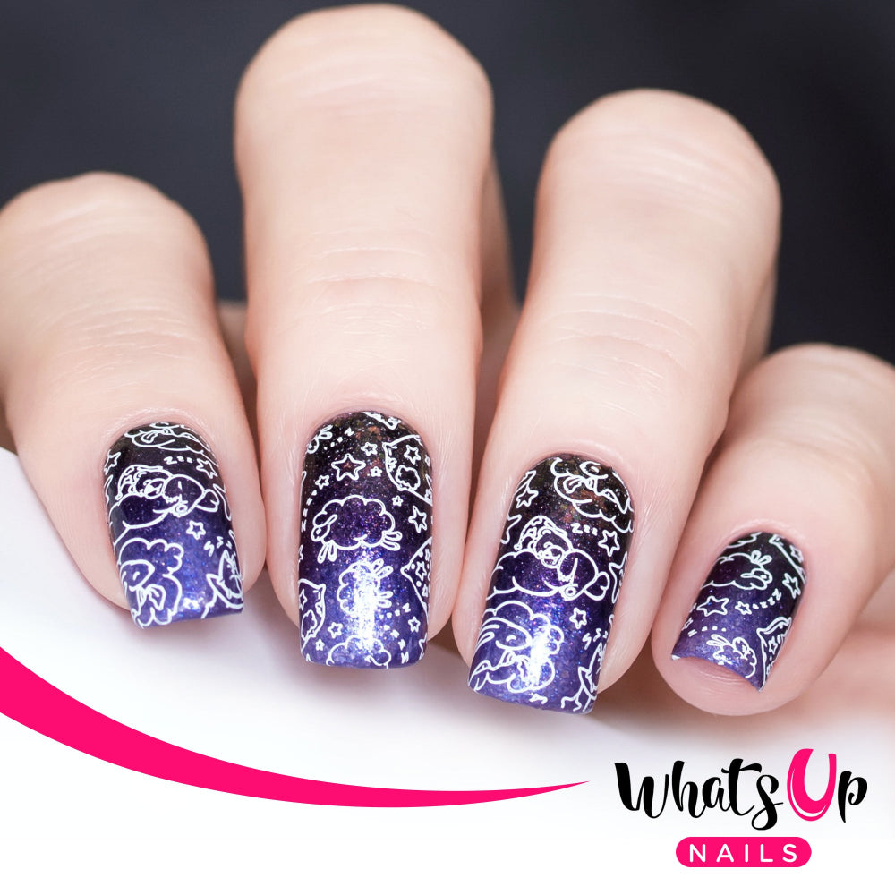 dark purple nails with white stamping cloud design