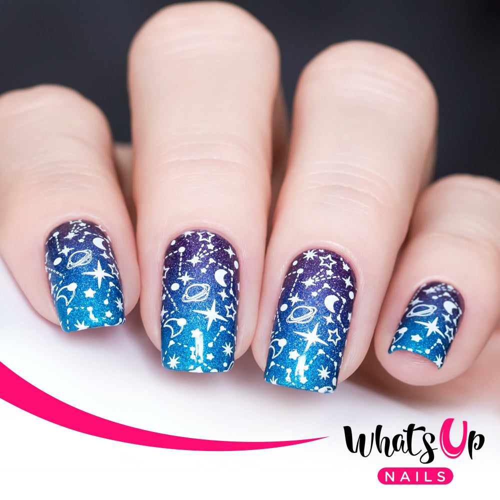 purple to blue nails with stamped white space design