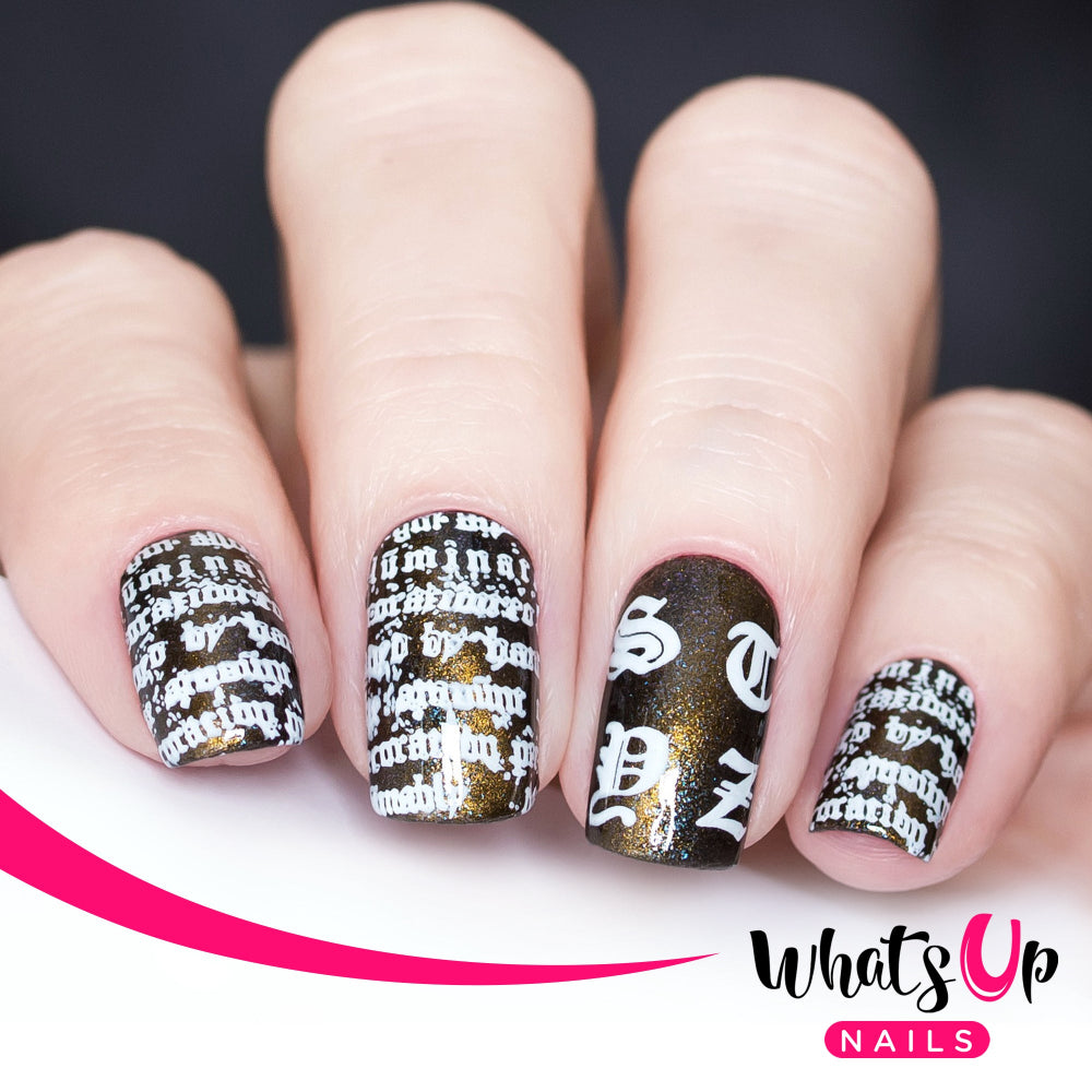 dark gold nails with white stamping gothic typeface