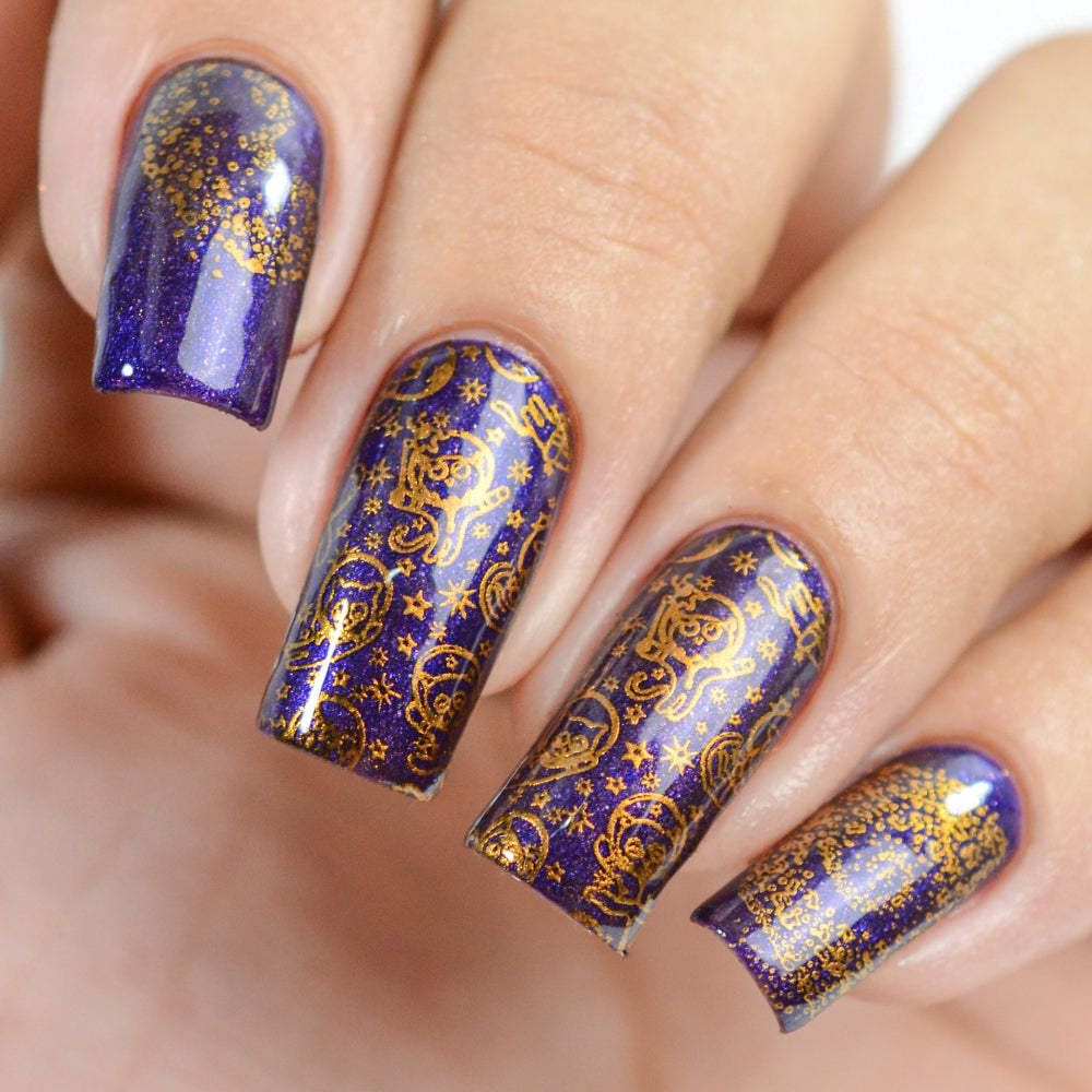 purple and gold space design nail art