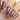 purple and gold space design nail art