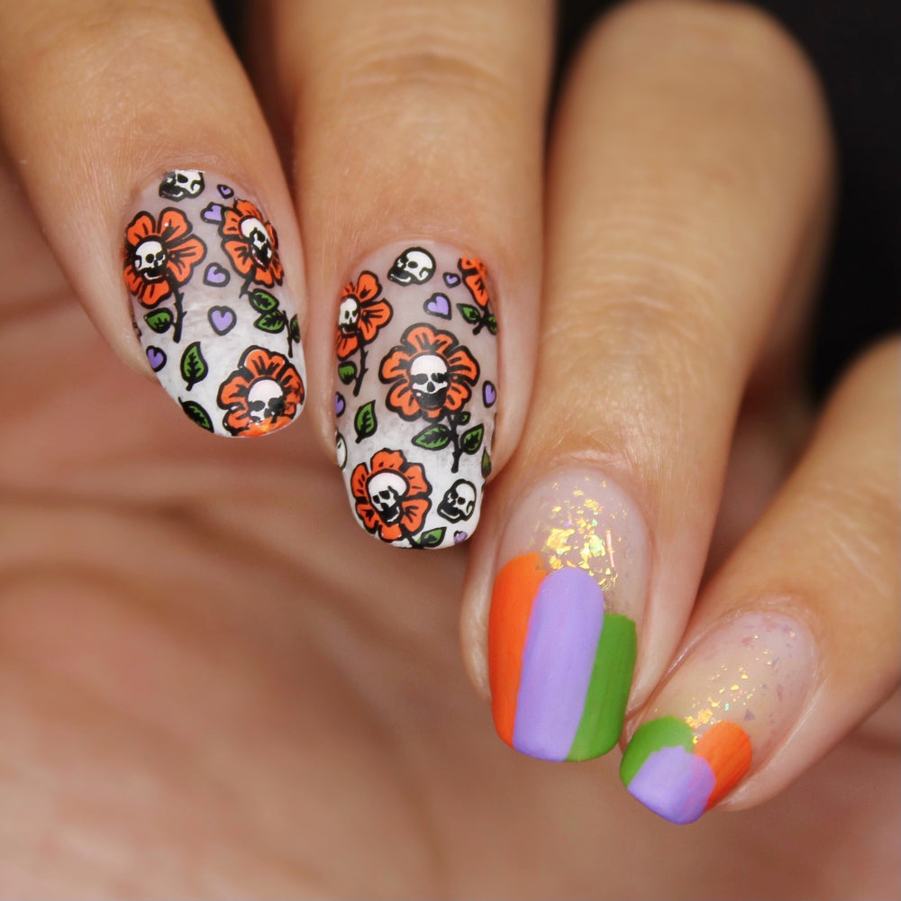 skull flower nail art, orange and purple