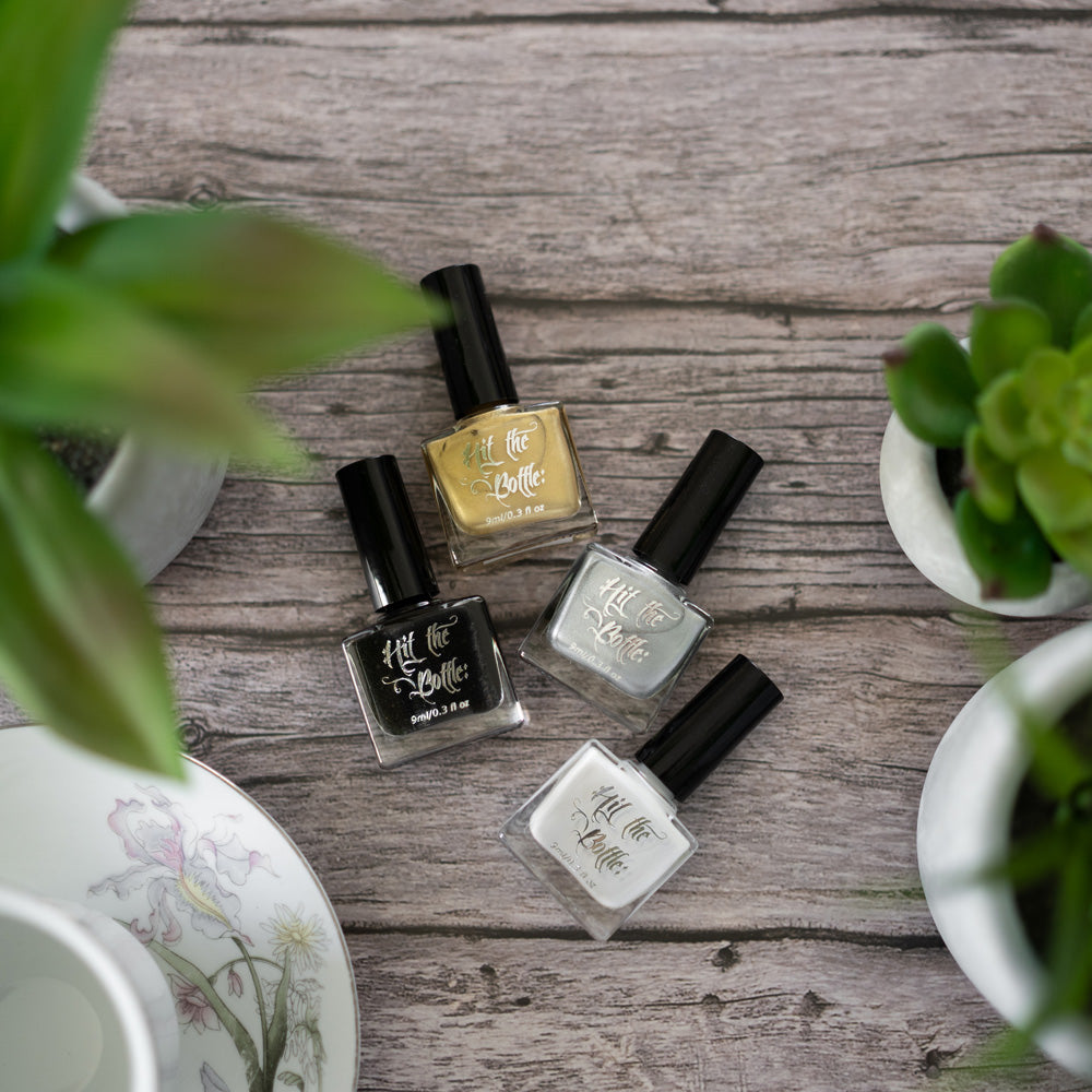 Array of different stamping polish colours, in neutral warm tones. 