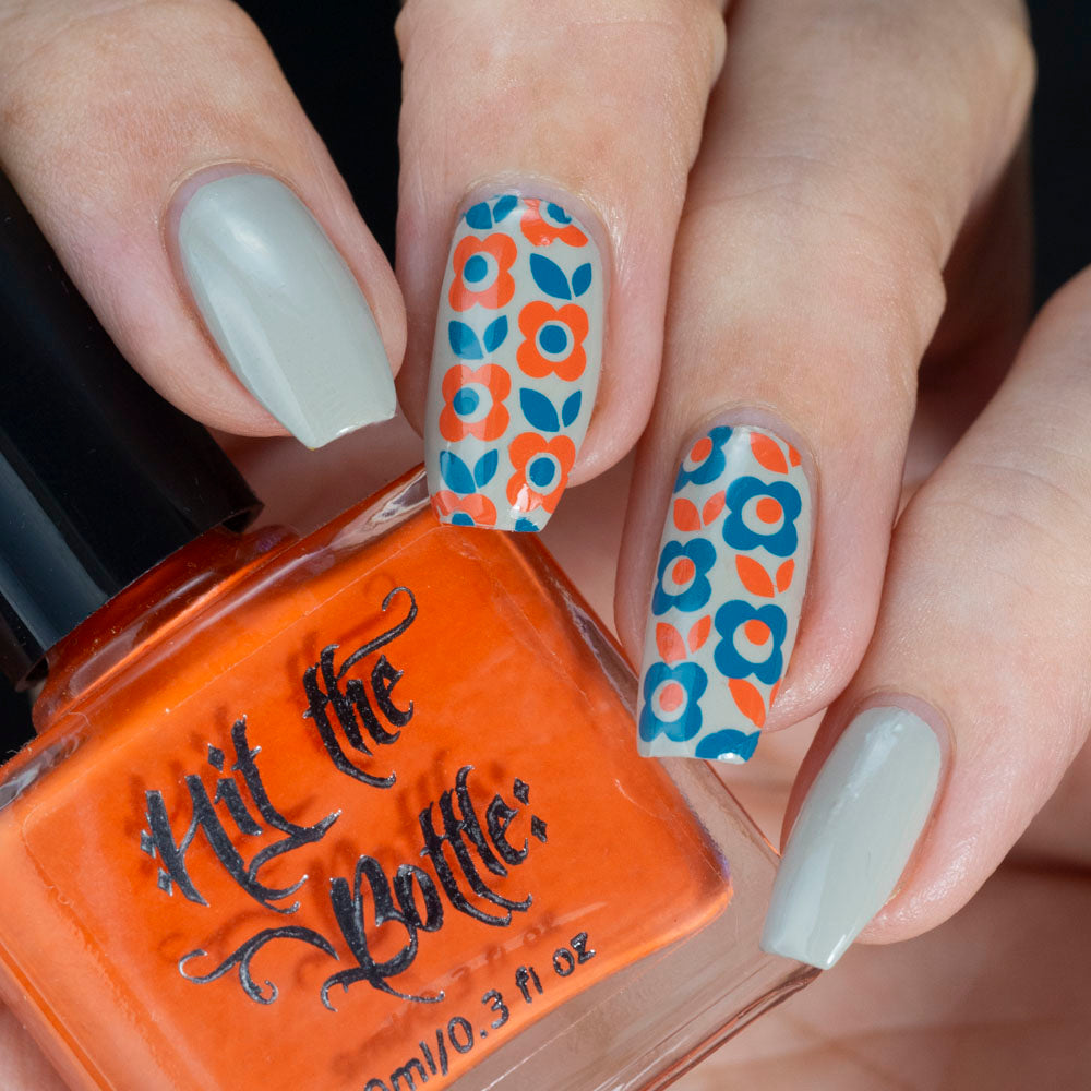 grey nails with orange and blue retro floral stamping design 