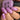 Pink nail polish bottle and nails with matching polish