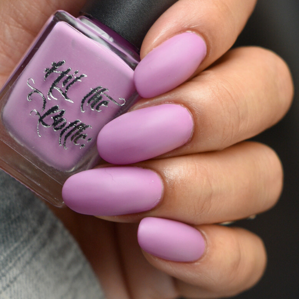 Hand with pink nail polish