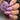 Hand with pink nail polish