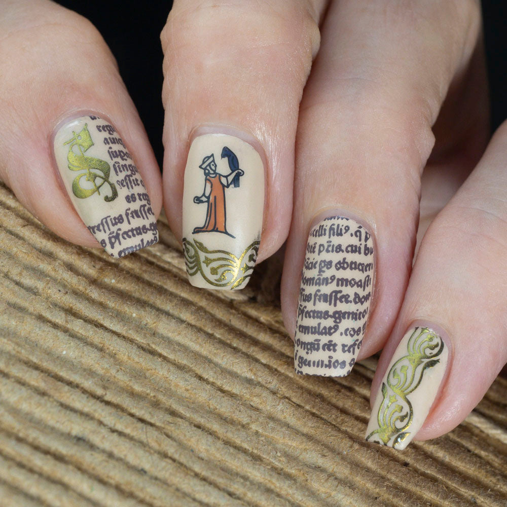 Nails with medieval manuscript text and illustration. Embossed lettering in gold 