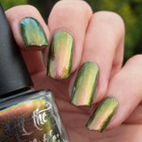 "Bronzewing Fling" a multichrome nail polish from Hit the Bottle. Shifts from a rosy copper, to gold to a brilliant green. 