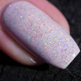 holo-topcoat-over-pale-pink-in-sun-macro-one-nail