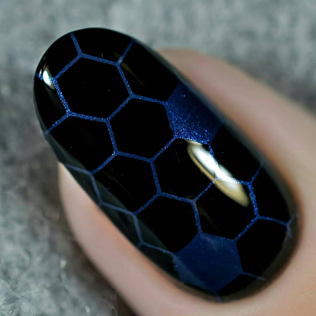 blue polish stamped over black 