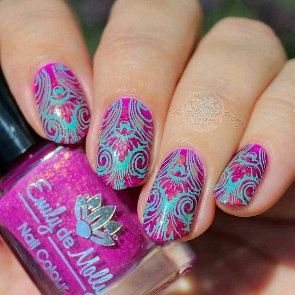 aquamarine stamping over bright magenta base 