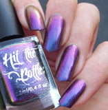 "Pheasantly Surprised" multichrome nail polish from Hit the Bottle. Shifts from denim blue, to purple to magenta.