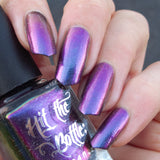 "Pheasantly Surprised" multichrome nail polish from Hit the Bottle. Shifts from denim blue, to purple to magenta.