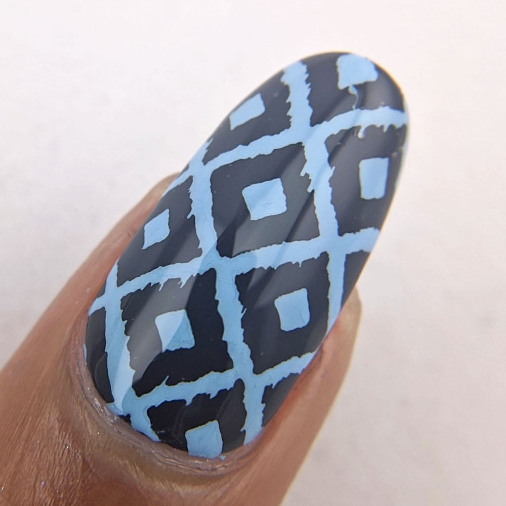 denim blue stamping over dark grey base nail art swatch 