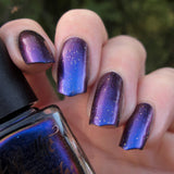 "Bowerbird's Treasure" multichrome nail polish by Hit the Bottle. Shifts from royal blue, to purple, to coppery red. 