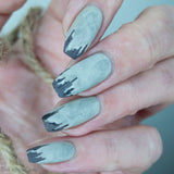 Zombie nails. Stamped in grey with the Embrace the Darkside plate. Stamped to have torn edges. 